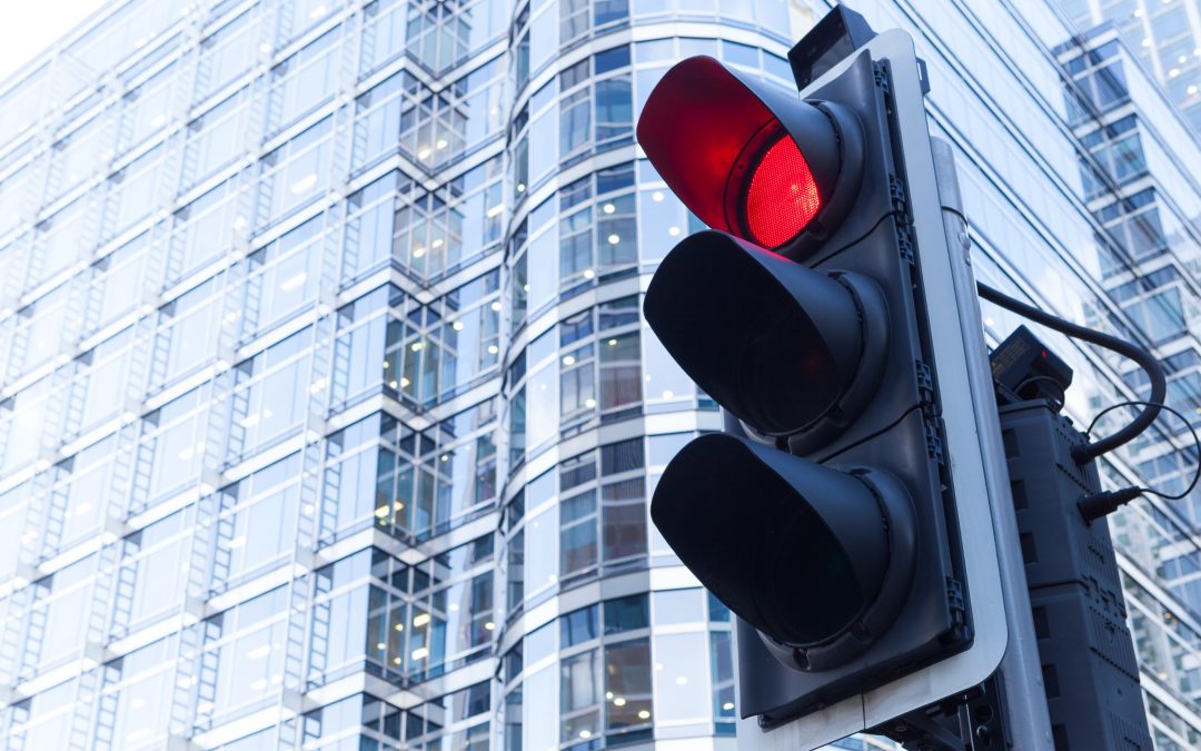 Image for travel vaccine traffic light course Travel health shows a traffic light on red