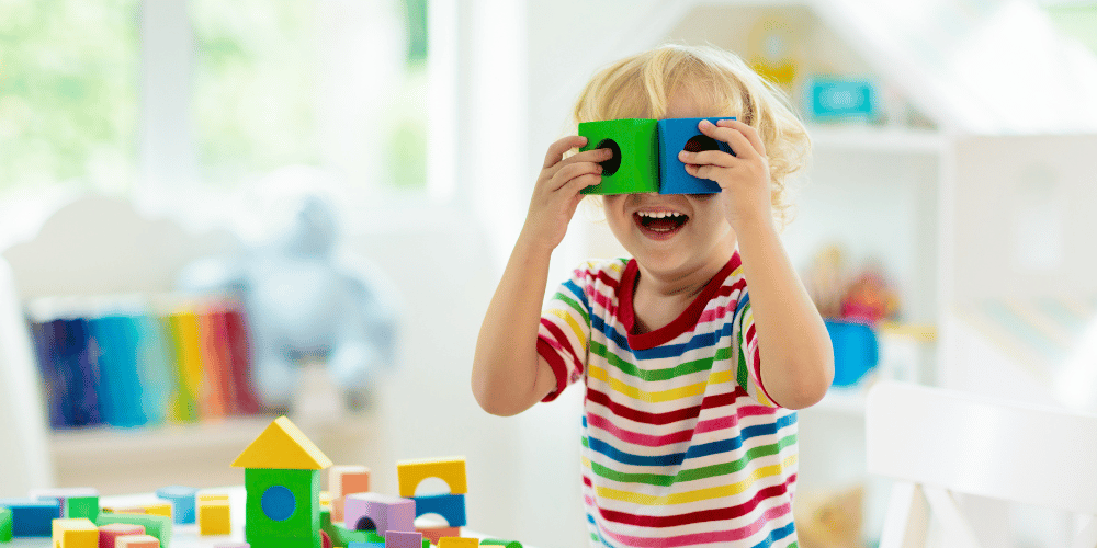 Image of a child playing with toys