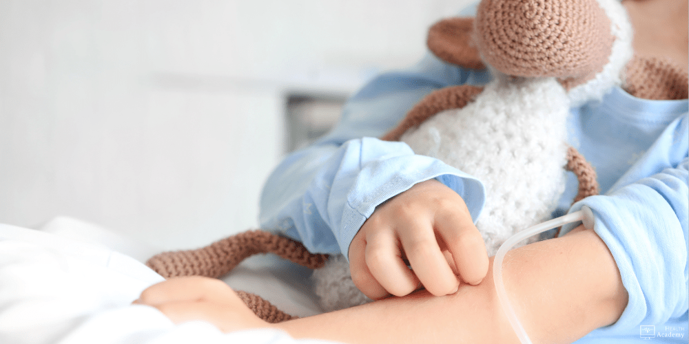 Image of child holding a toy in hospital.
Assessing pain in children.