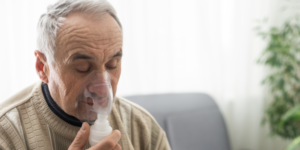 Image showing elderly man with oxygen mask for Advanced Asthma Management in Primary Care