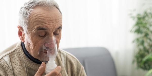 Image showing elderly man with oxygen mask for Advanced Asthma Management in Primary Care