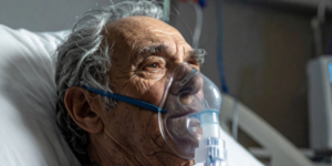 Image showing man in bed with oxygen mask Advanced COPD Management in Primary Care