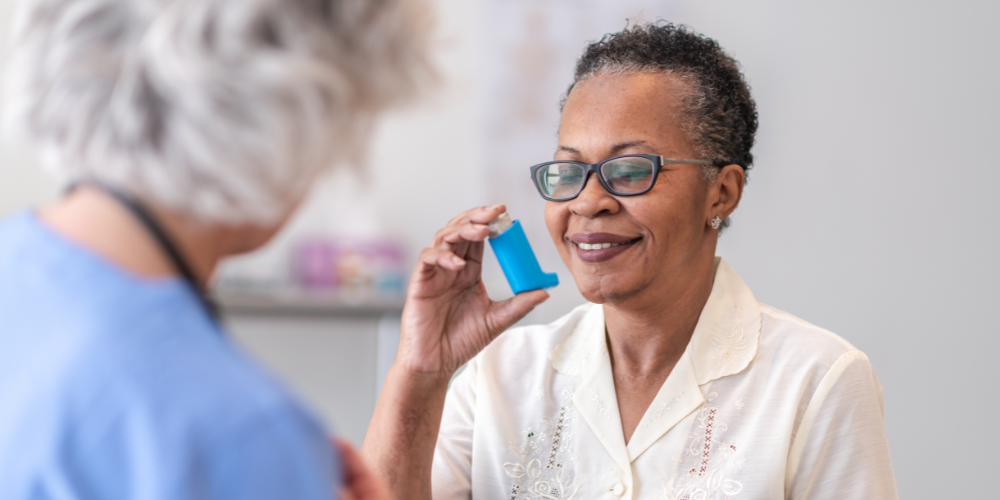 Image showing patient being taught inhaler technique at an asthma review