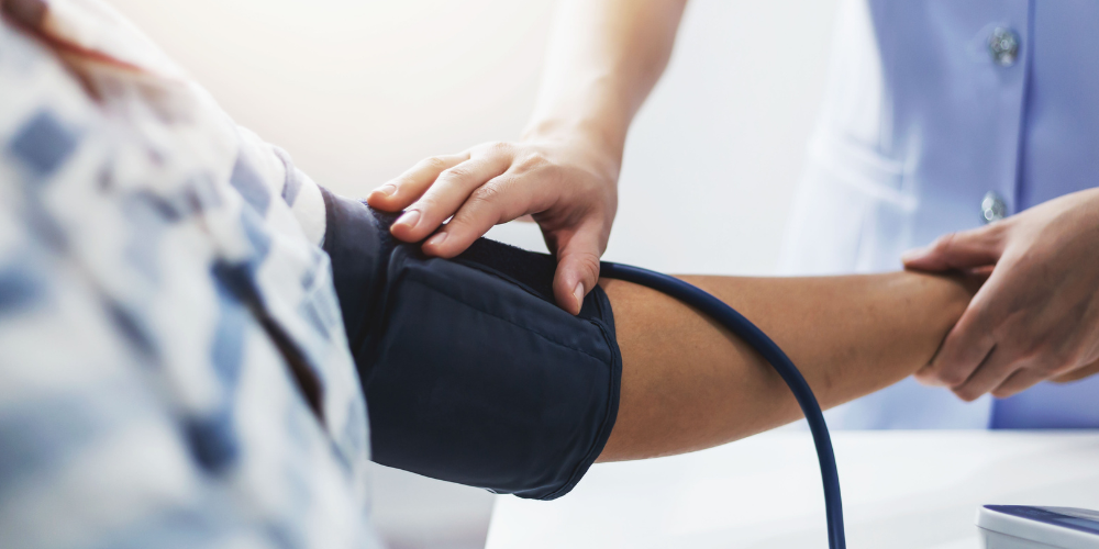 Image showing patient having their blood pressure checked in clinic